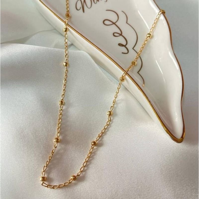 COLAR CHOKER DE BOLINHAS ESPAÇADAS