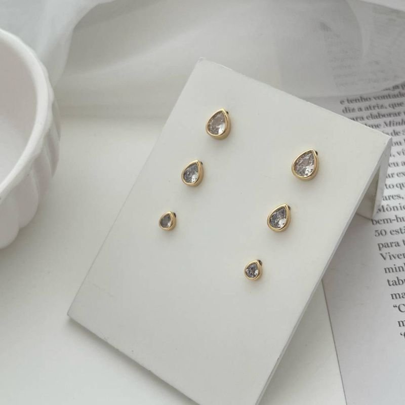 BRINCO GOTA DE LUZ P - OURO 18K - 17