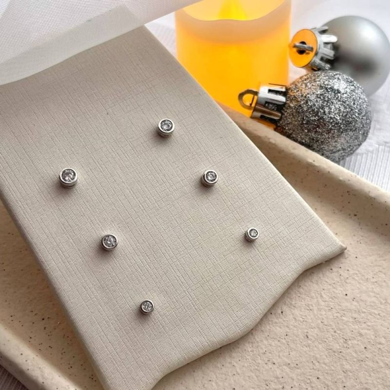 BRINCO PONTO DE LUZ PP - OURO 18K - 33