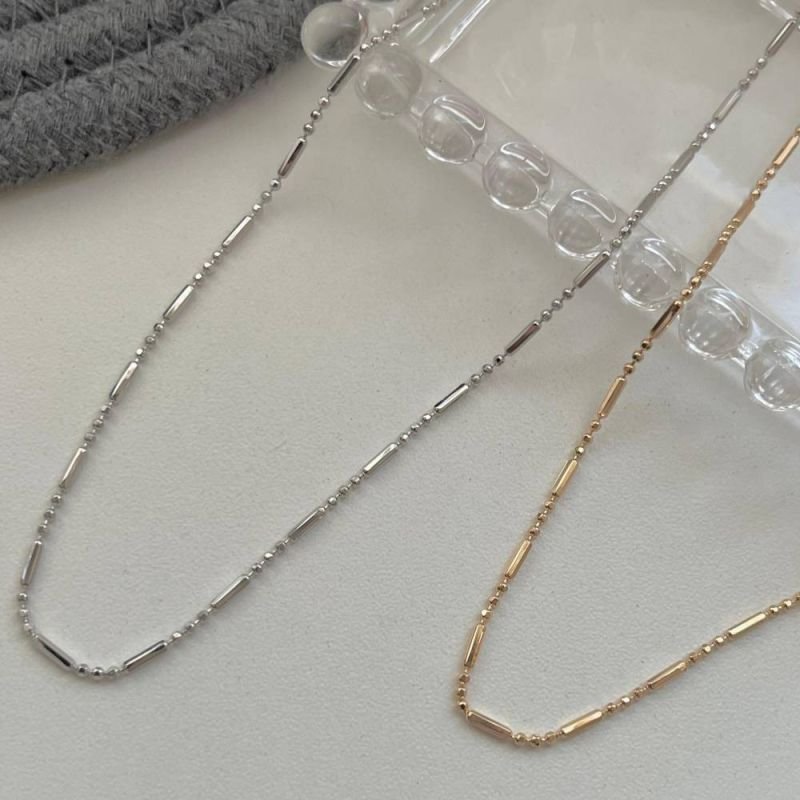 CHOKER 3 BOLINHAS ESPAÇADA