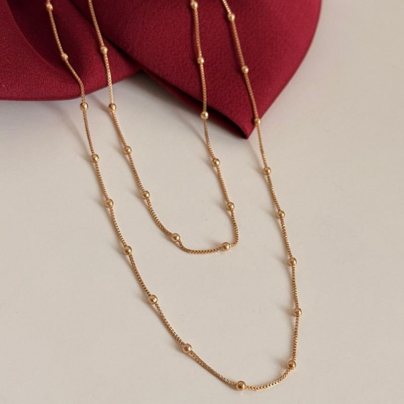 COLAR DUPLO BOLINHAS