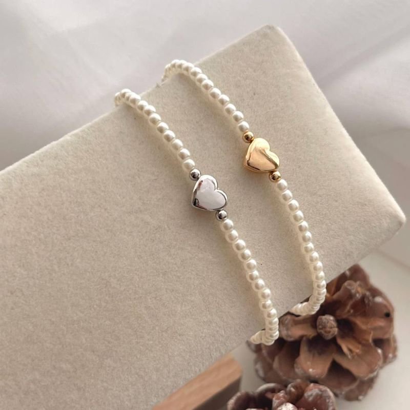 PULSEIRA PÉROLAS COM CORAÇÃO