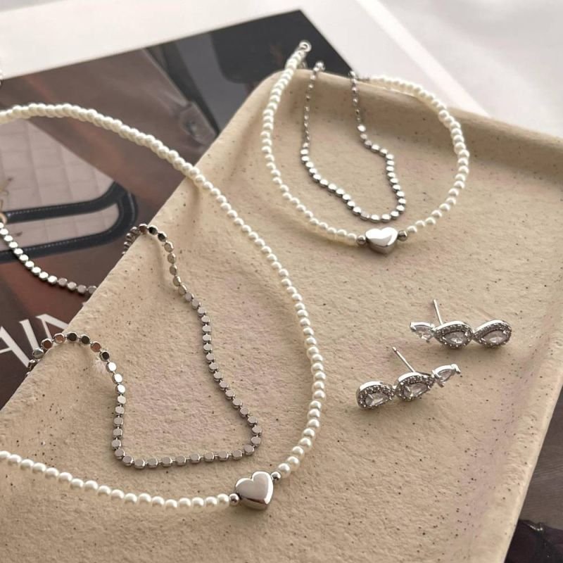 PULSEIRA PÉROLAS COM CORAÇÃO